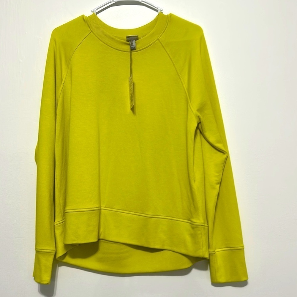 A New Day green sweater